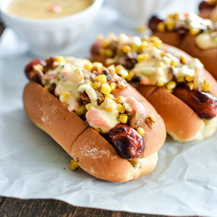 Hot Dogs with Chipotle Cheese Sauce and Bacon-Corn Relish